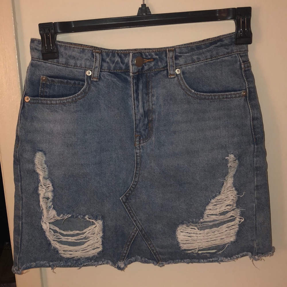 Denim skirt size medium light blue color. Price $7